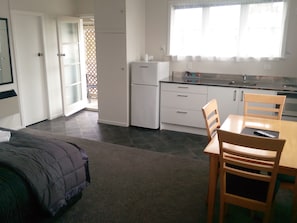 One Bedroom | Private kitchenette | Microwave, electric kettle, toaster, cookware/dishes/utensils