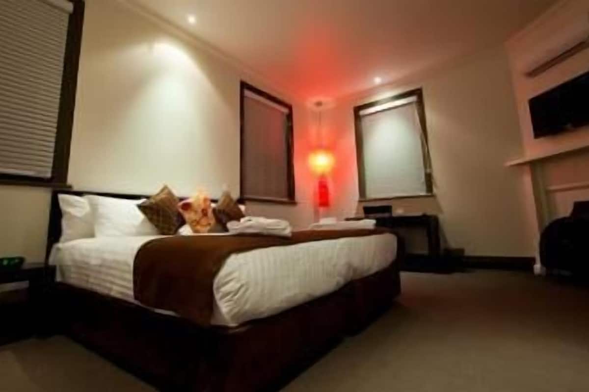 premium bedding, desk, iron/ironing board, rollaway beds