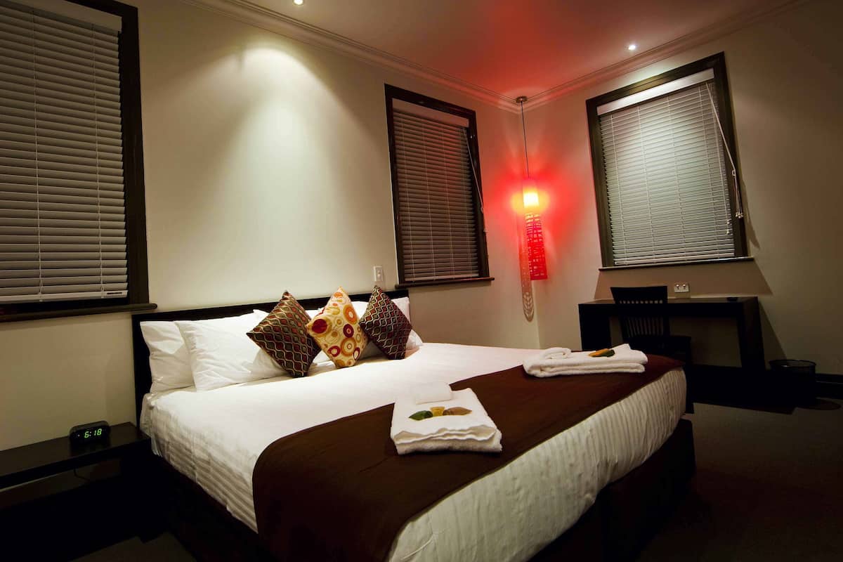 king room, shared bathroom | premium bedding, desk, iron/ironing board, rollaway beds