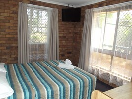 Standard Suite, 2 Bedrooms, Non Smoking, Kitchen (Suite) | Laptop workspace, blackout drapes, iron/ironing board, free WiFi