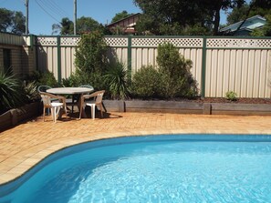 Outdoor pool, open 8:00 AM to 7:00 PM, pool loungers