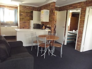 Standard Suite, 2 Bedrooms, Non Smoking, Kitchen (Suite) | Laptop workspace, blackout drapes, iron/ironing board, free WiFi