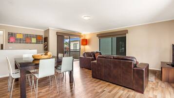 Two Bedroom Upstairs Apartment | Living area | 40-inch TV with cable channels