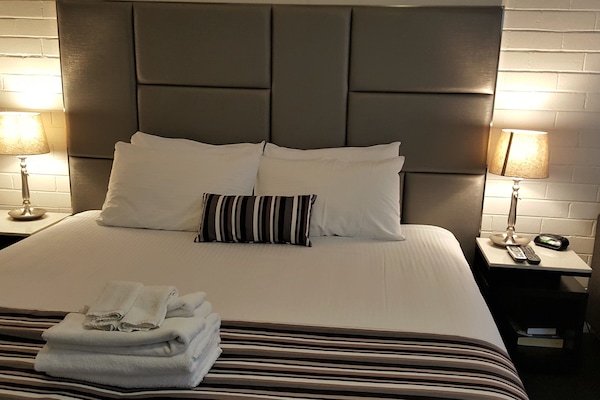 Side Queen Room | Desk, blackout curtains, iron/ironing board, free cots/infant beds