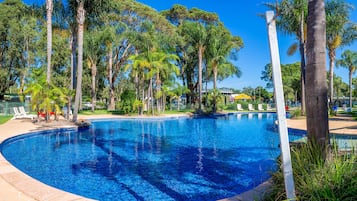 Outdoor pool, pool umbrellas, sun loungers