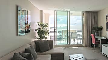 Executive Apartment, 2 Bedrooms, 2 Bathrooms | Living area | Flat-screen TV, DVD player