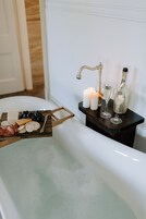  The Empress Suite | Bathroom | Hair dryer, towels, soap, shampoo