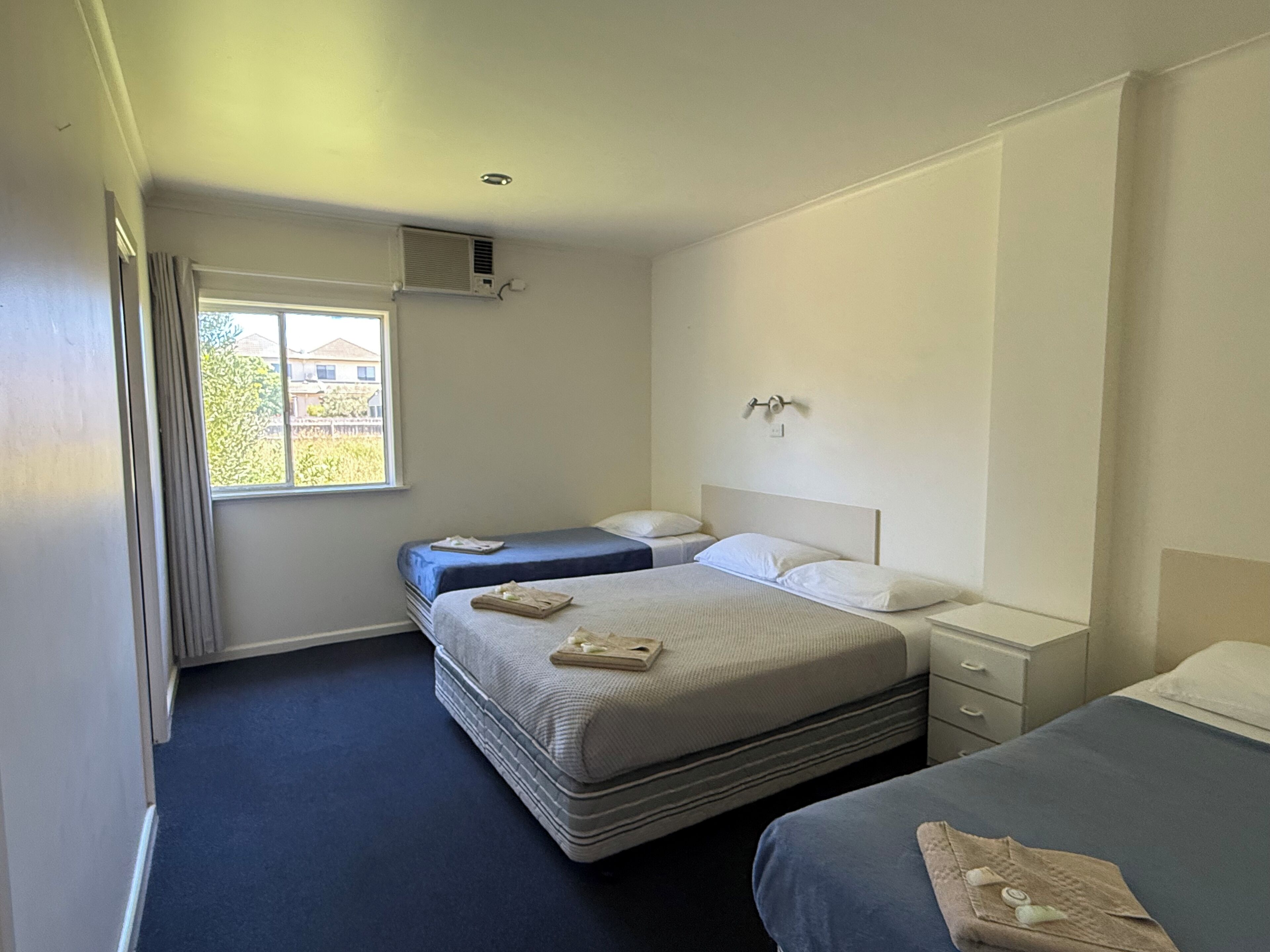 Family Apartment, 1 Bedroom | Blackout drapes, iron/ironing board, free WiFi, bed sheets