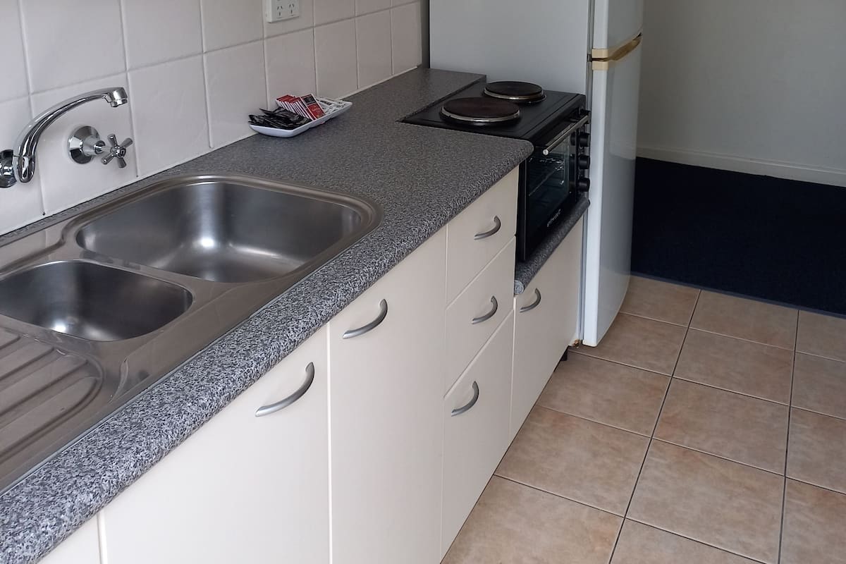 Family Apartment, 1 Bedroom | Private kitchen | Fridge, microwave, coffee/tea maker, electric kettle