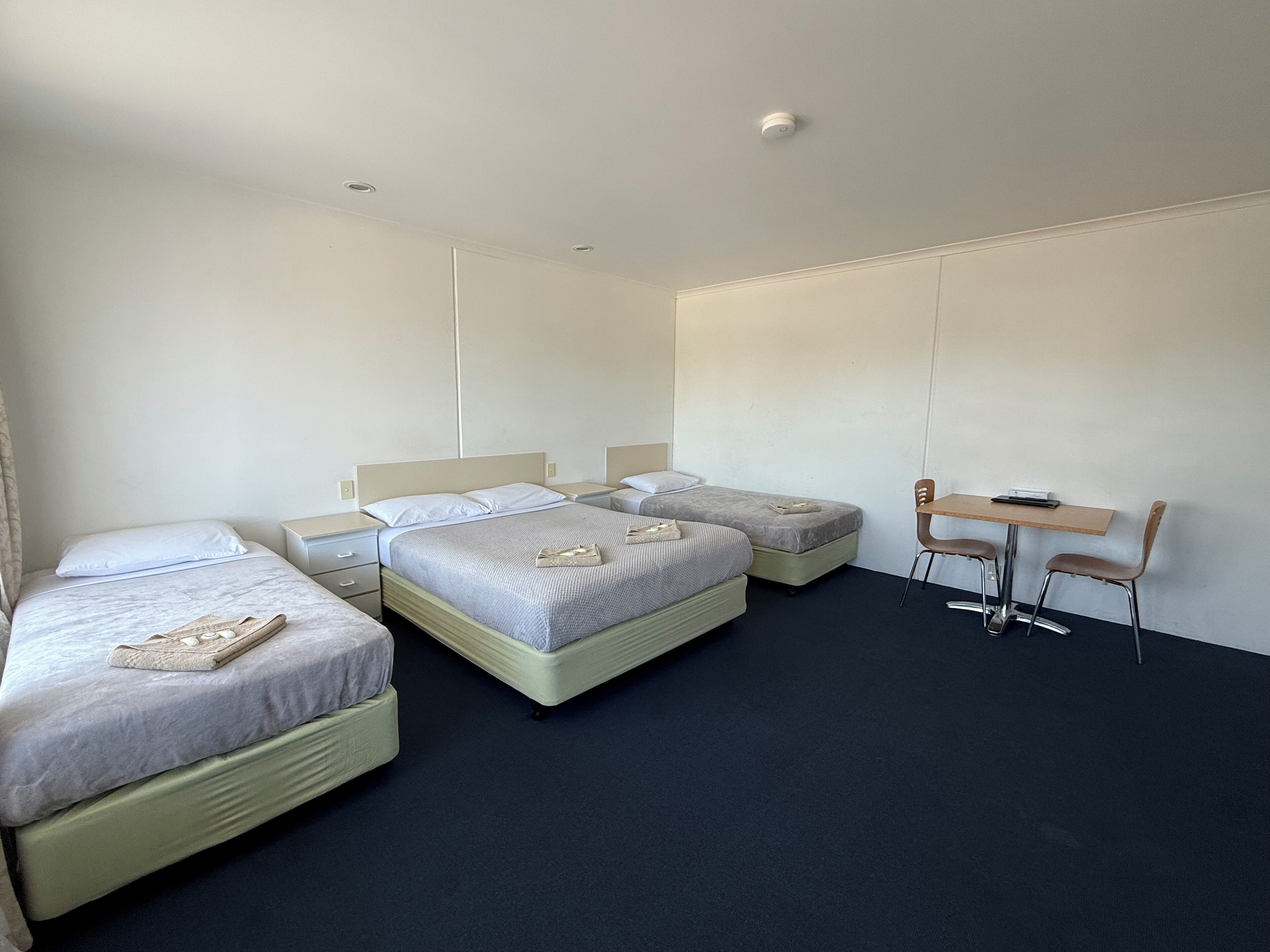 Family Quadruple Room, 1 Bedroom | Blackout drapes, iron/ironing board, free WiFi, bed sheets