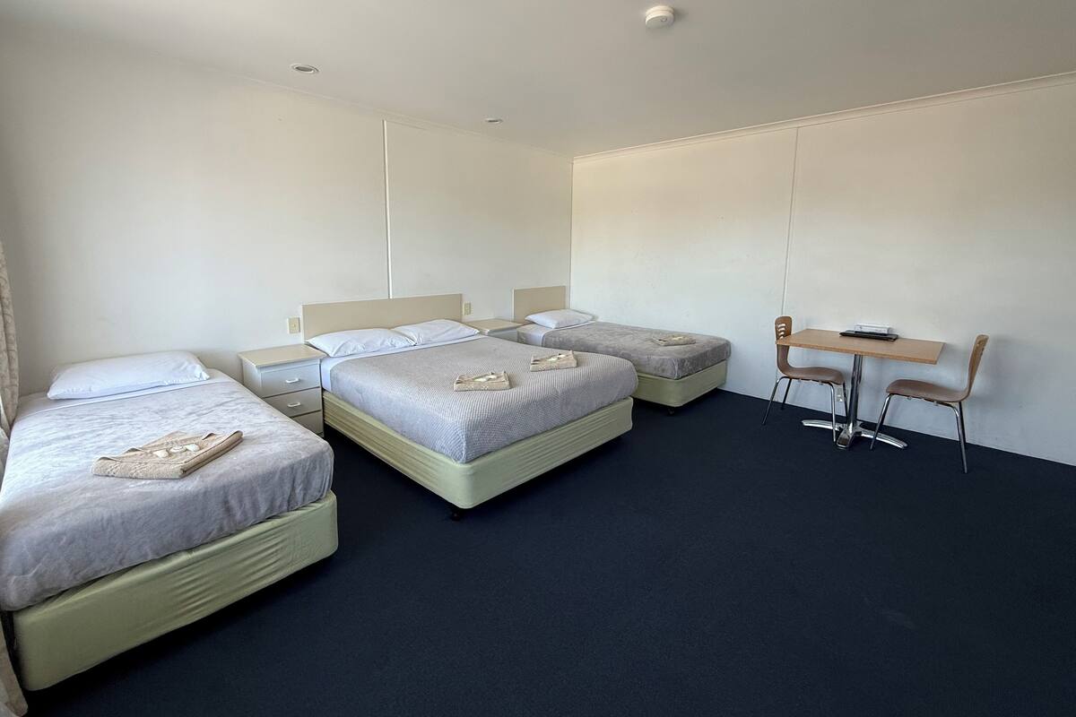 Quadruple Room | Blackout drapes, iron/ironing board, WiFi (free), bed sheets
