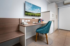 Minibar, desk, laptop workspace, blackout curtains