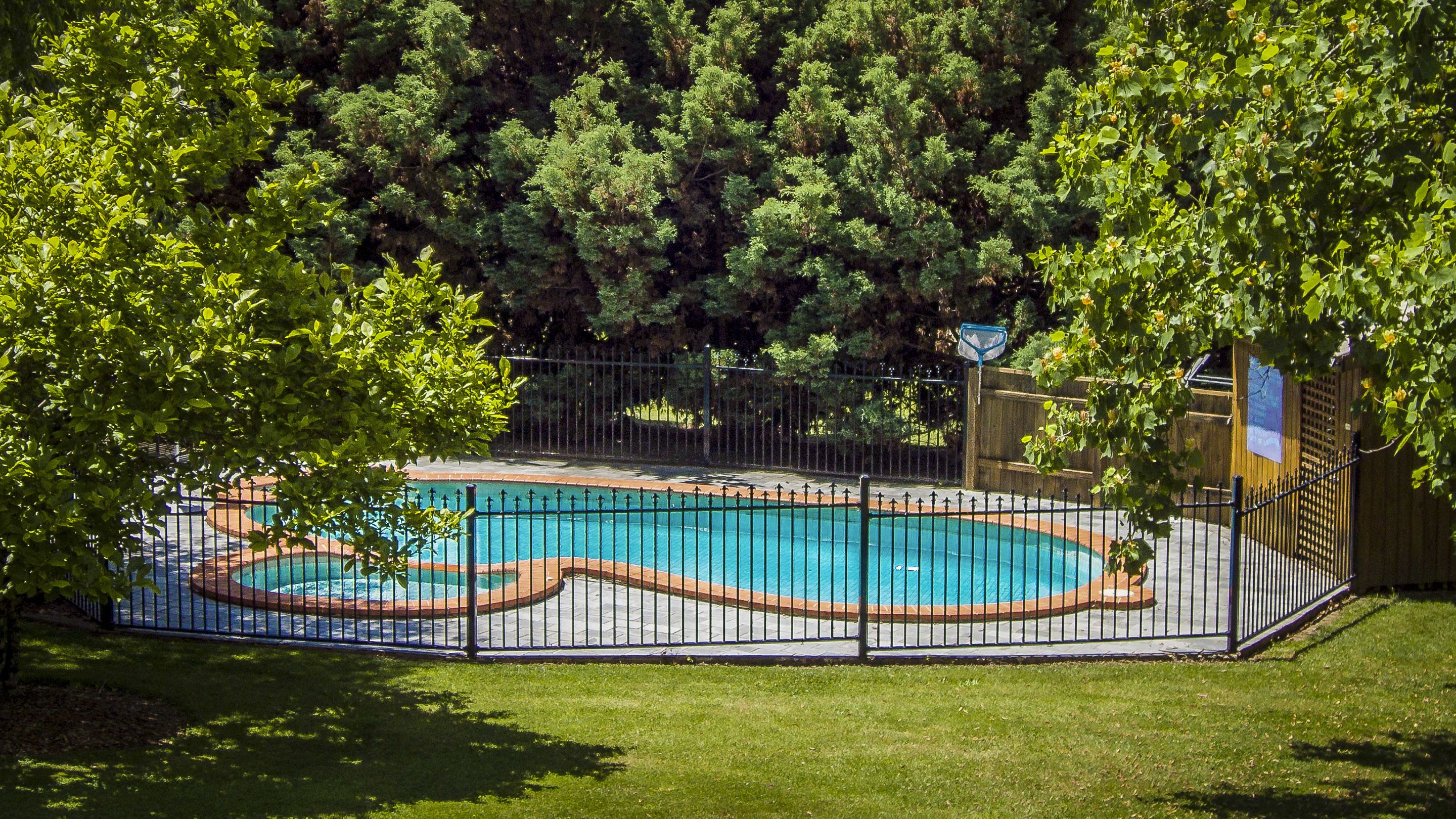 Outdoor pool, a heated pool, pool umbrellas, sun loungers