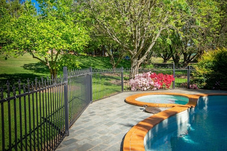 Outdoor pool, a heated pool, pool umbrellas, sun loungers