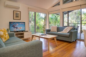 50-inch flat-screen TV with digital channels, TV, DVD player