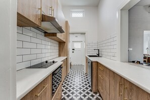 Standard Apartment, 1 Bedroom, Non Smoking, Kitchen (The Wisteria Suite) | Private kitchen | Fridge, oven, stovetop, dishwasher - Wyatt Guest House (Mount Gambier)