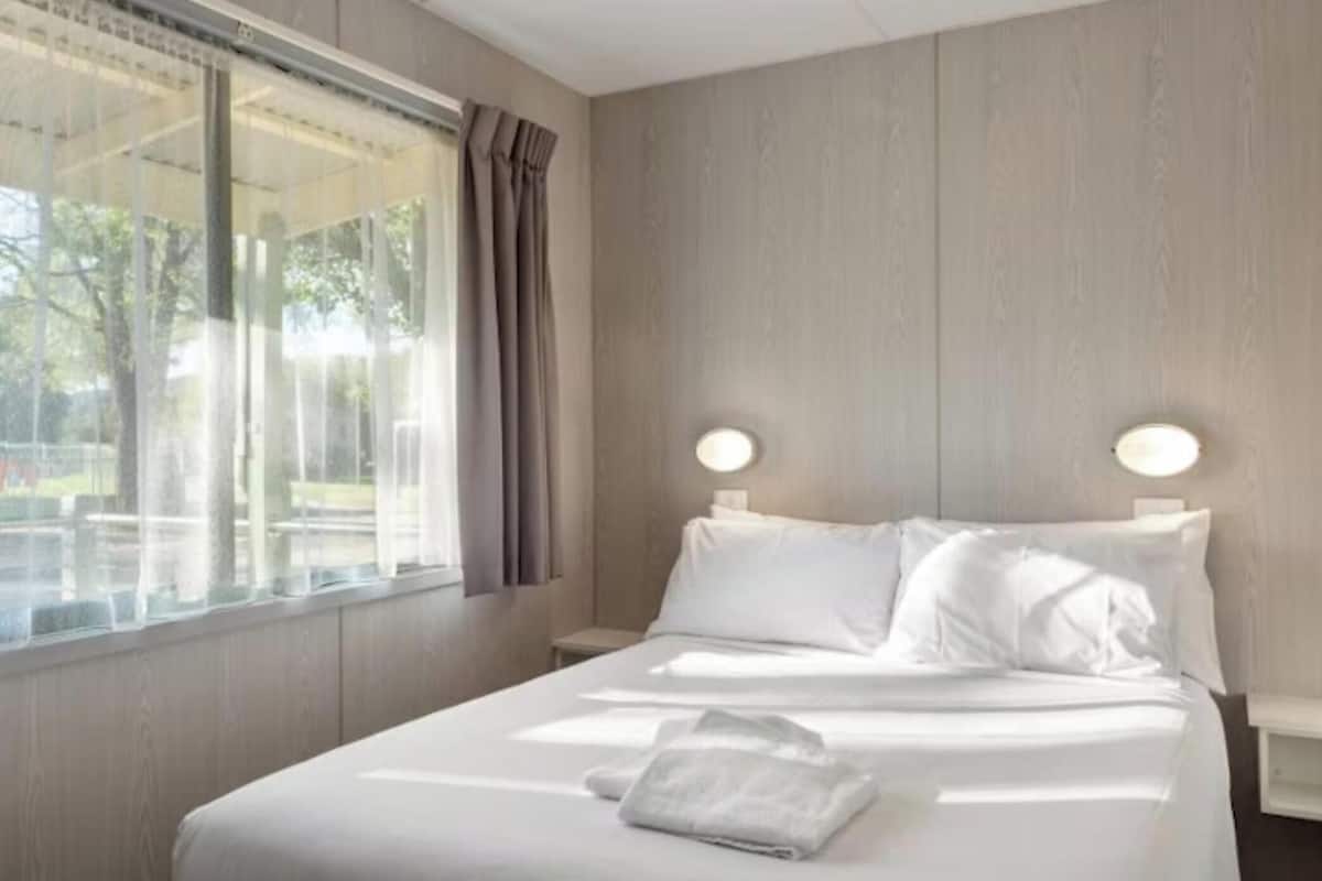 Standard 2 Bedroom Cabin - Sleeps 5 - Pet Friendly | Individually decorated, individually furnished, blackout drapes