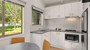Economy 2 Bedroom Cabin Sleeps 4 (2Dbl) | Private kitchen | Fridge, microwave, coffee/tea maker, electric kettle