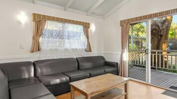 Superior 2 Bedroom Cabin - Sleeps 6 | Living area | LCD TV