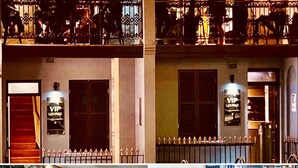 A building with a VIP lounge, a pool table, and a balcony with people. - The Dunkirk Hotel (Pyrmont)