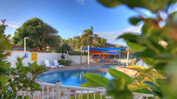 Outdoor pool, a heated pool, sun loungers