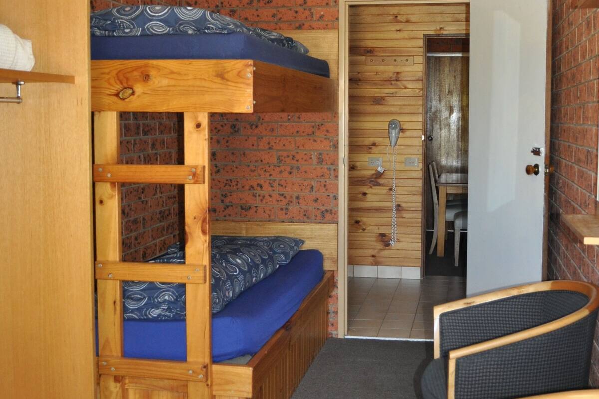 Standard Quadruple Bunk Room | Blackout drapes, iron/ironing board (on request), bed sheets