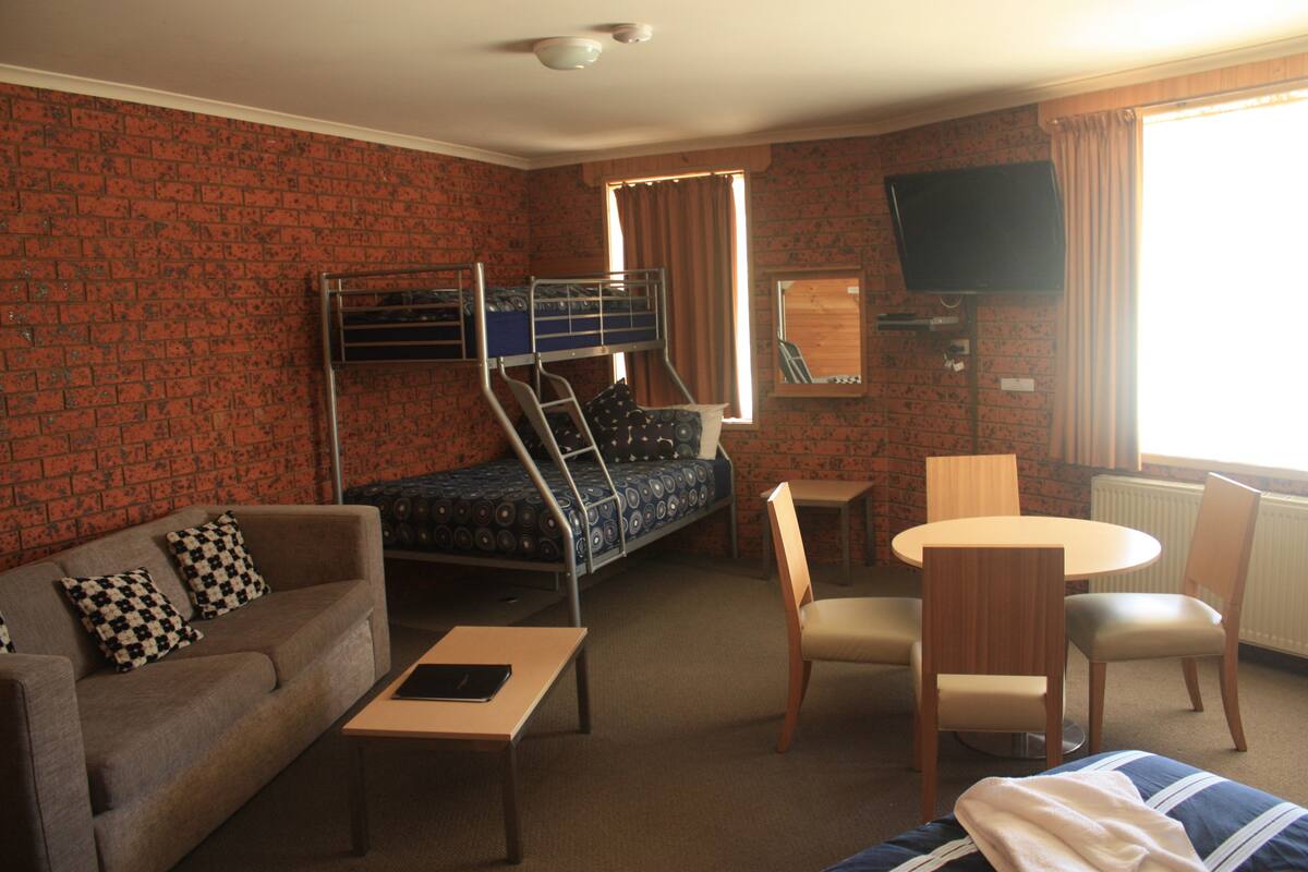 One Bedroom Family Suite | Blackout drapes, iron/ironing board (on request), bed sheets
