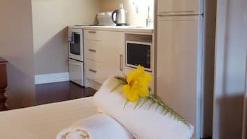 Studio Suite Deluxe, 1 giường cỡ king, bếp | 1 phòng ngủ, bộ trải giường bằng vải cotton Ai Cập