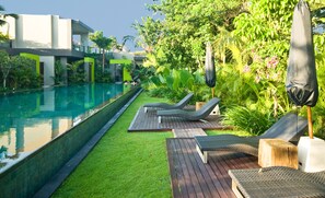 Indoor pool, outdoor pool, pool umbrellas, sun loungers