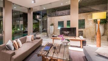 Junior Suite, Private Pool | Living area | 32-inch LCD TV with premium TV channels, TV, DVD player