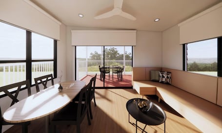 Deluxe 2 Bedroom Cabins - S6 | Living room | Flat-screen TV