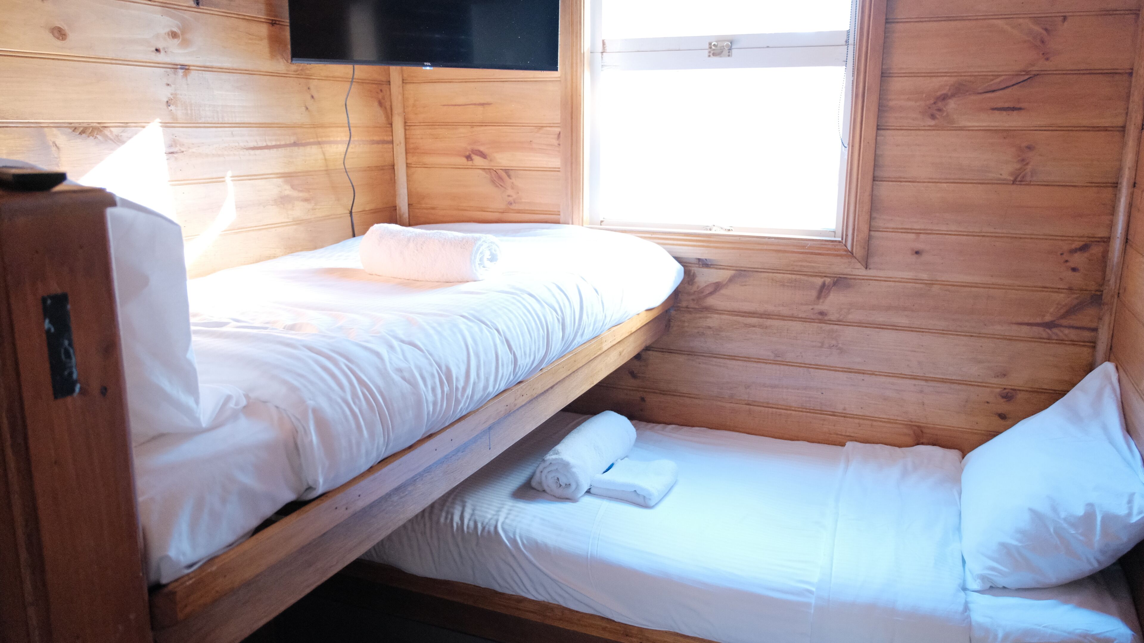 Small L shaped bunk room with shared bathroom | WiFi, individually furnished, bed sheets