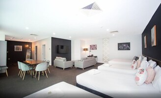 The Loft Suite | Minibar, desk, blackout drapes, iron/ironing board