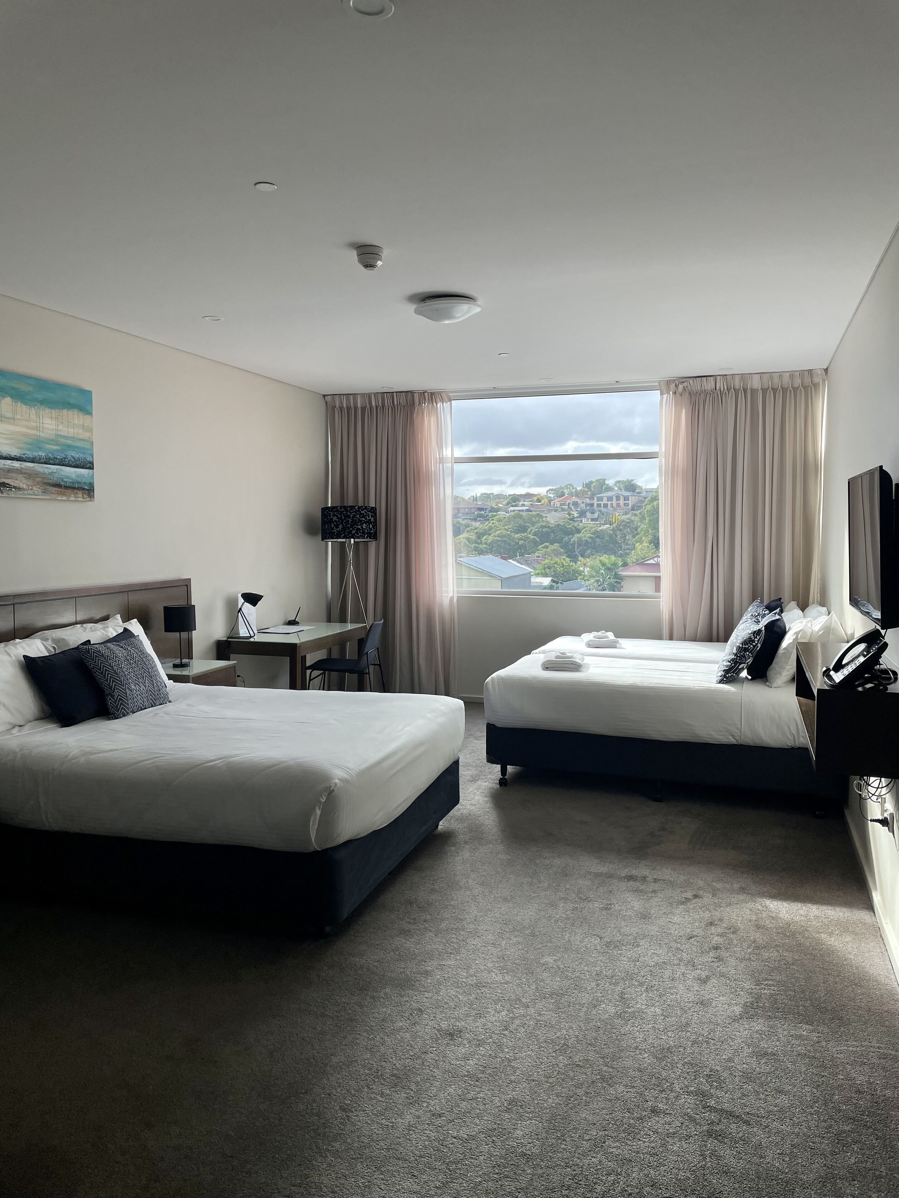 family room | 1 bedroom, minibar, desk, blackout curtains