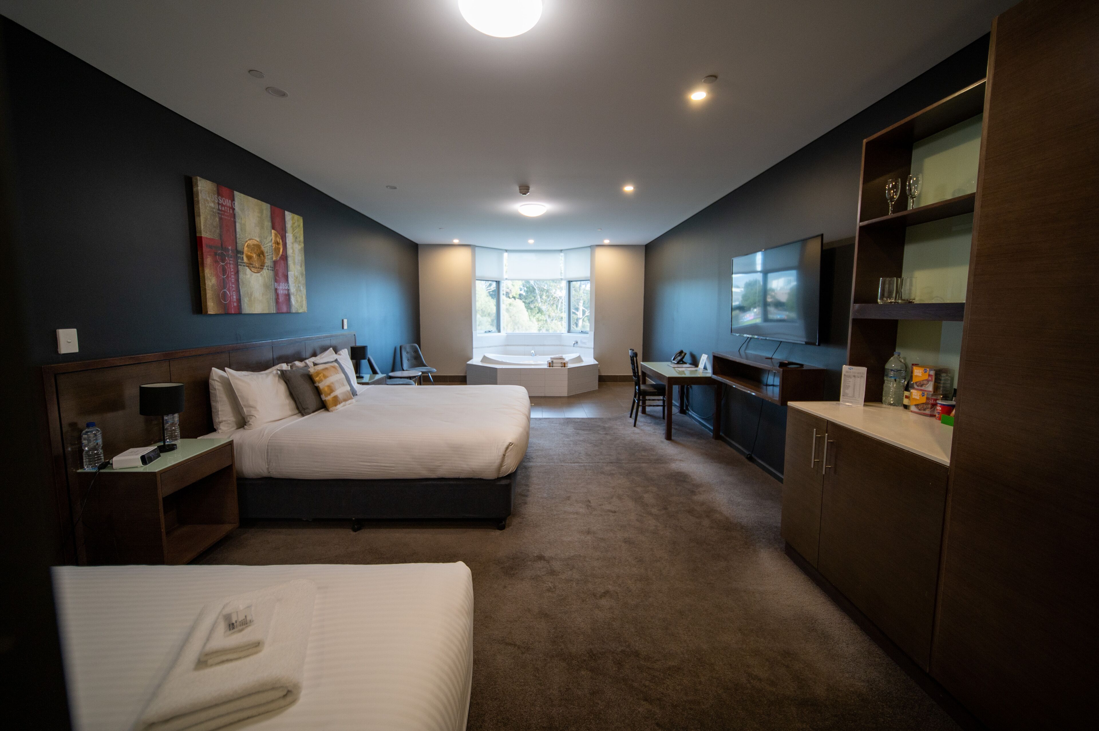 deluxe spa suite | 1 bedroom, minibar, desk, blackout curtains