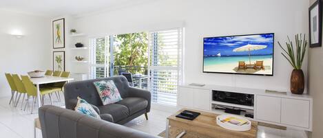 Deluxe Apartment, 2 Bedrooms | Living area | 40-inch flat-screen TV with digital channels, TV, DVD player