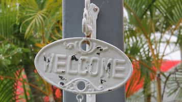 Welcome to a serene garden oasis, where a charming entrance awaits.