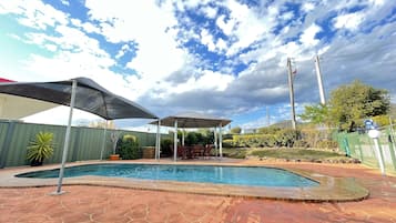 Outdoor pool, open 8:00 AM to 8:00 PM, free pool cabanas, pool umbrellas