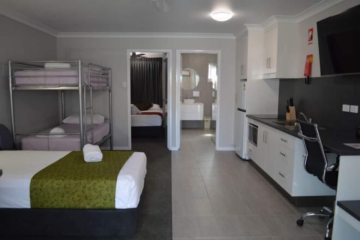 Individually furnished, desk, laptop workspace, iron/ironing board