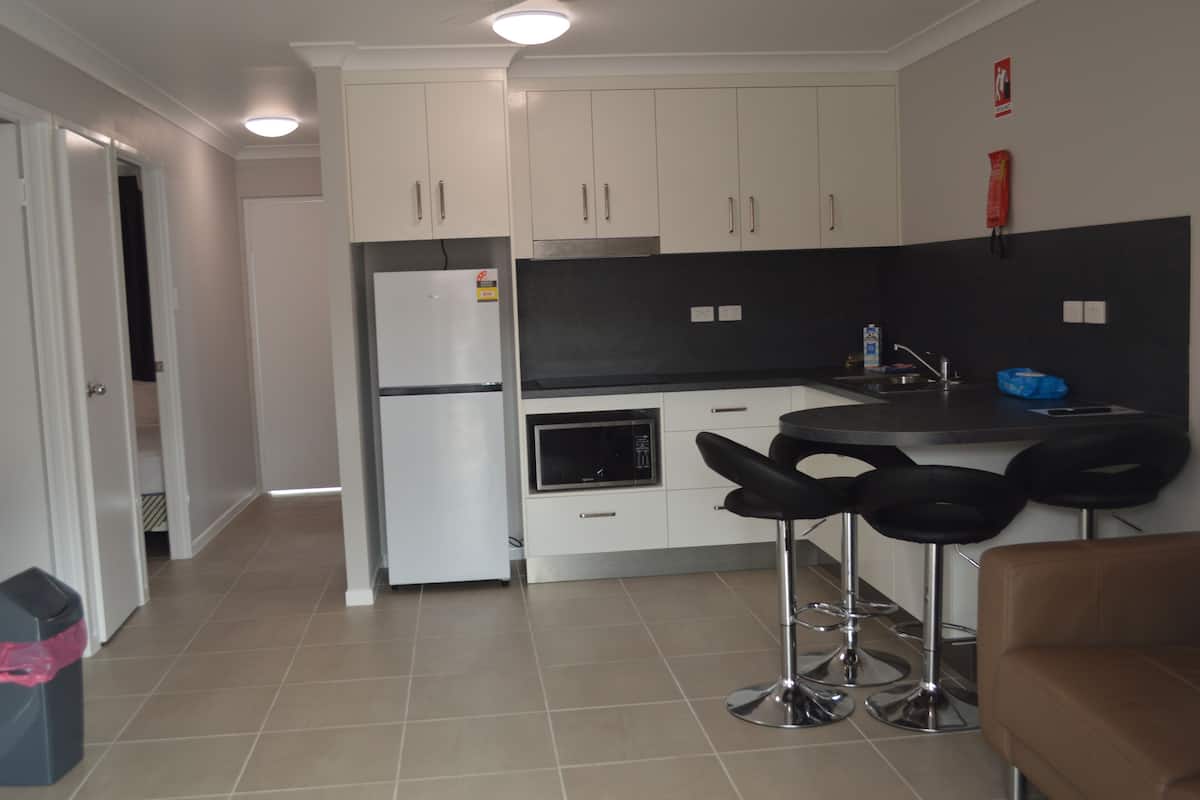 Superior Apartment | Private kitchen | Fridge, microwave, coffee/tea maker, electric kettle