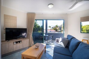 Standard Apartment, 1 Bedroom, Non Smoking, Kitchen | Living area | 49-inch flat-screen TV with cable channels, Smart TV, Netflix