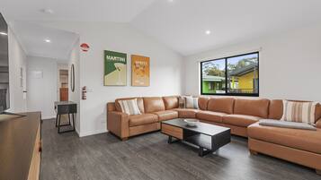 Cabana superior, 3 quartos | Área de estar