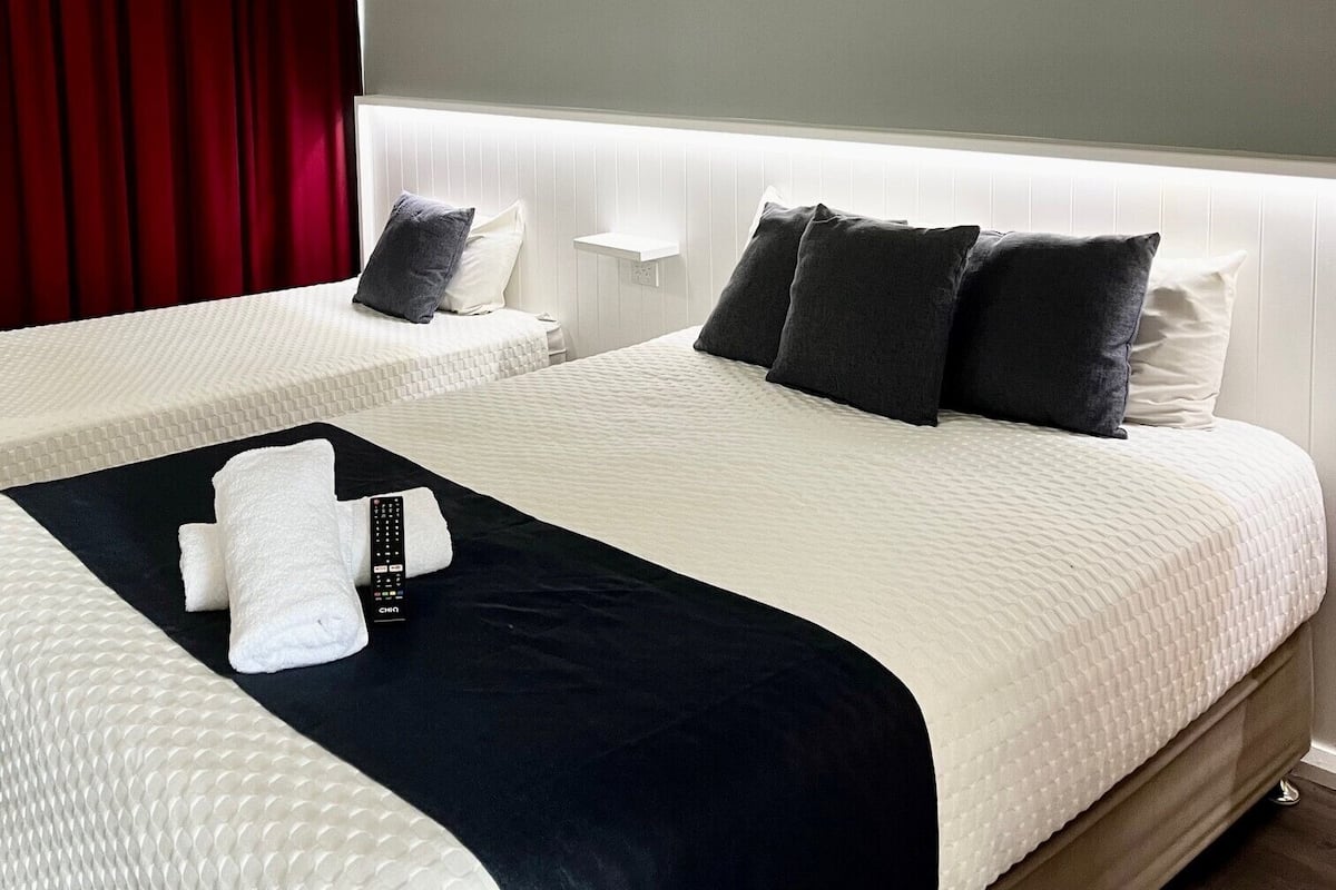 Queen Plus Room | Premium bedding, soundproofing, bed sheets