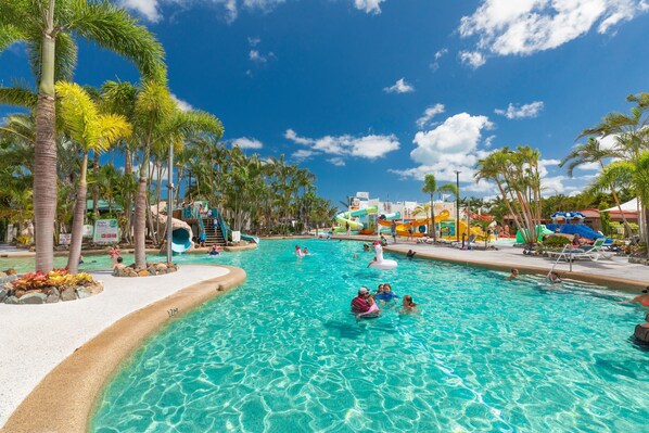 Outdoor pool, open 7:00 AM to 9:30 PM, pool umbrellas, pool loungers - BIG4 Adventure Whitsunday Resort (Cannonvale)