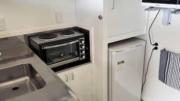 Estúdio | Cozinha privada | Geladeira, micro-ondas, fogão, cooktop