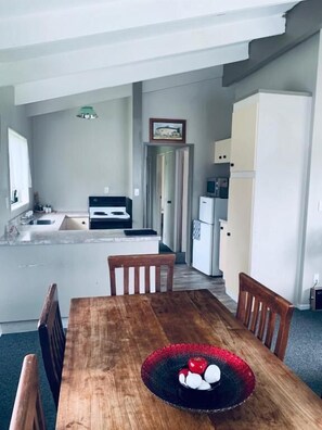 The Cottage - 2 Bedrooms Standalone Studio | Private kitchen | Fridge, microwave, oven, stovetop