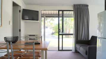 Standard Studio, Kitchen (Self Contained Unit) | Living area | TV