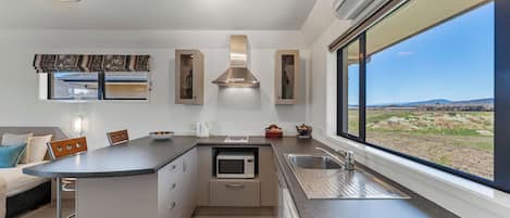 Luxury Spa Studio | Private kitchen | Mini-fridge, microwave, stovetop, coffee/tea maker