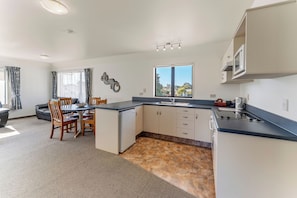 Two Bedroom Apartment | Private kitchen | Mini-fridge, microwave, stovetop, coffee/tea maker