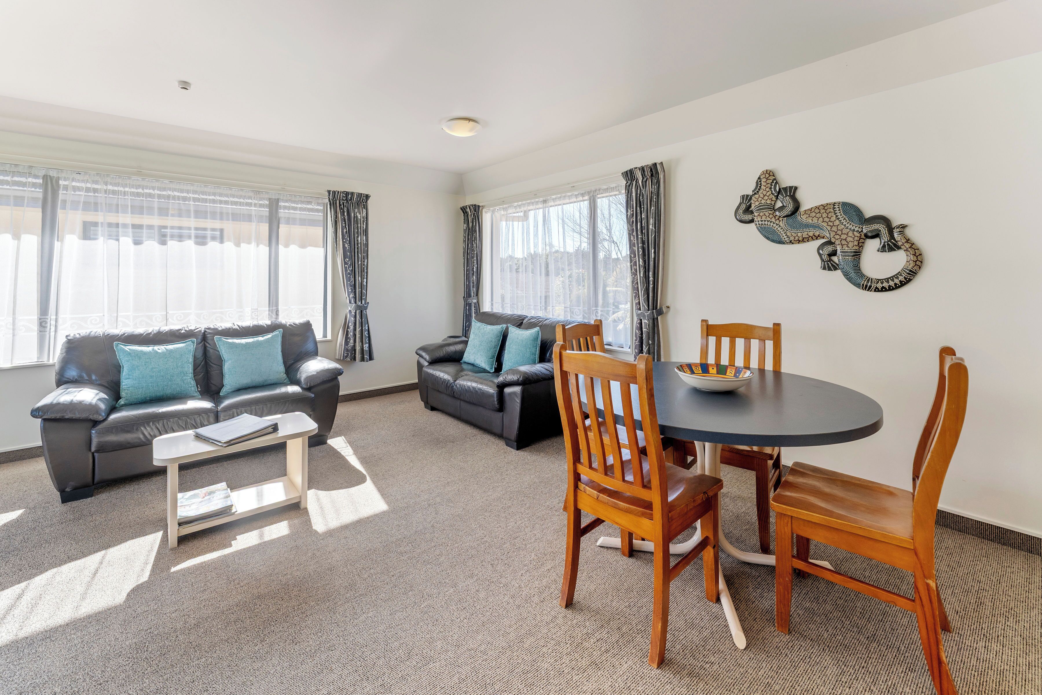 Two Bedroom Apartment | Living area | 32-inch flat-screen TV with satellite channels, TV, DVD player